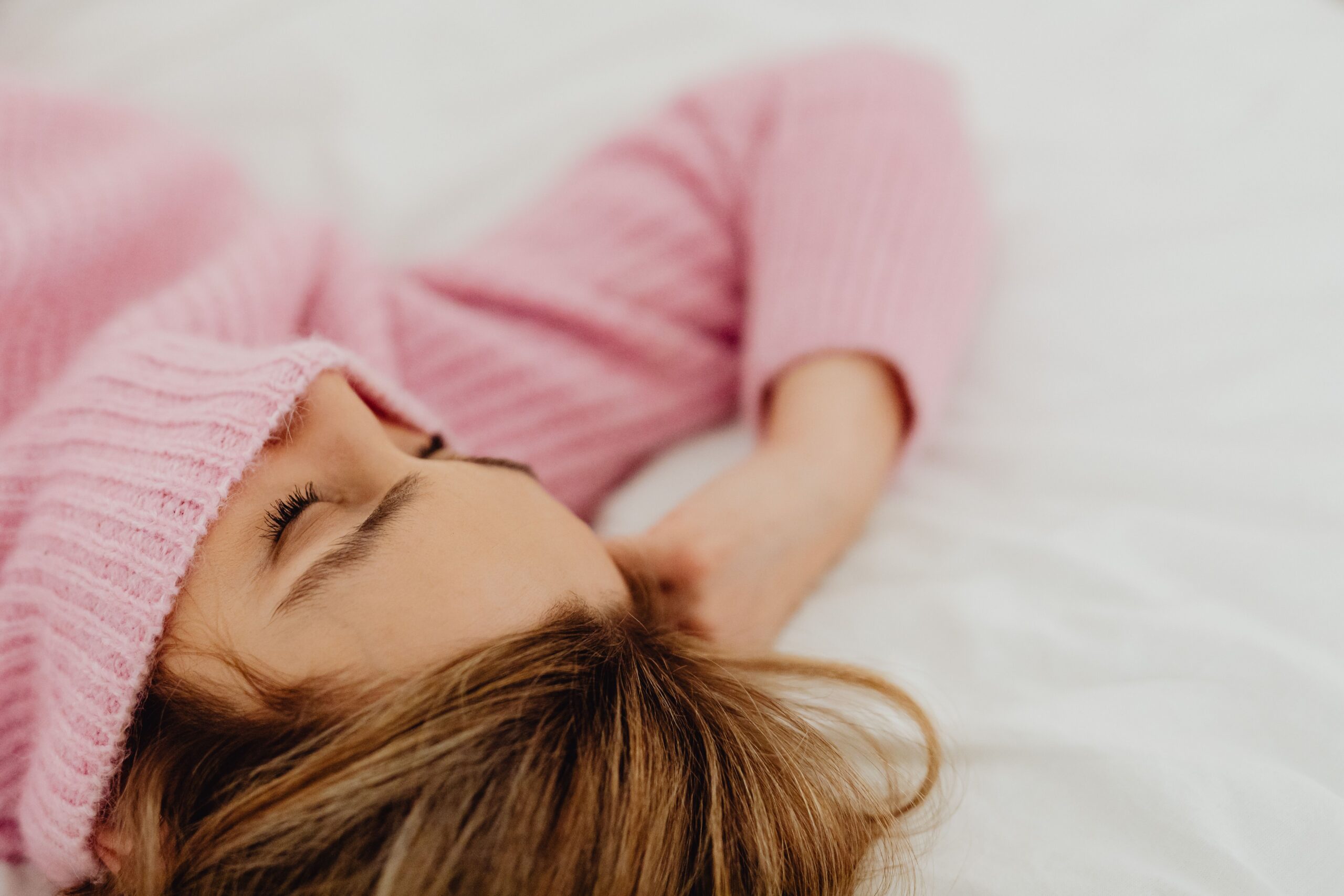 Woman resting in parasympathetic state for nervous system regulation